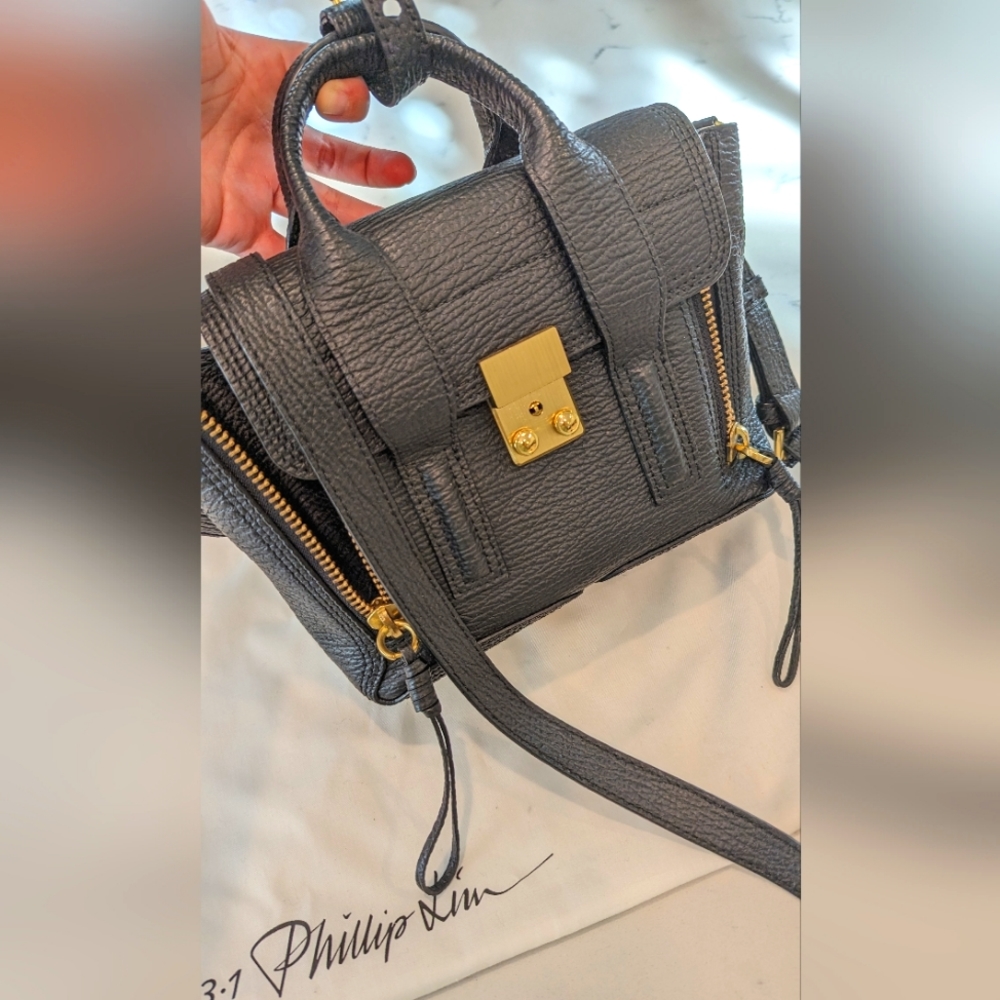 3.1 Phillips Lim small handle black bag